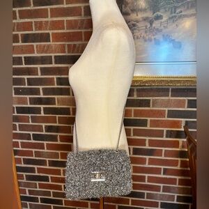 H&M Black Metallic crossbody bag. Handle drop 21 inches 8”W x 6”H x  2 1/2”D